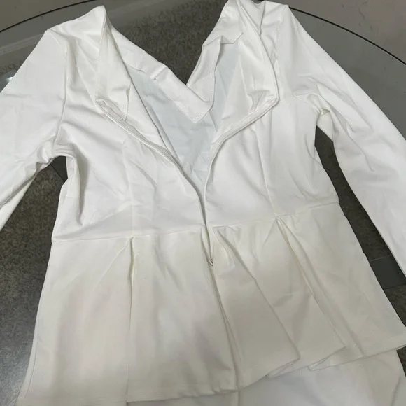 PEPLUM ONE PIECE JUMPSUIT WITH SIDE POCKETS. - Picture 10 of 13